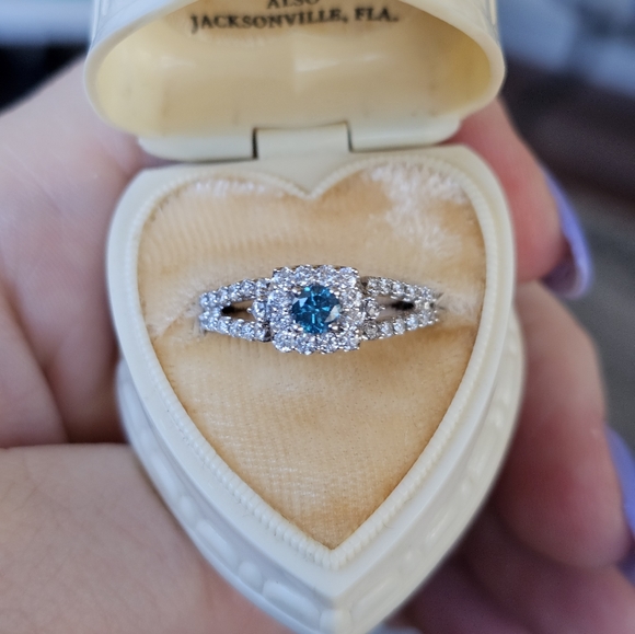 New. 10k Diamond ring Blue & White diamonds! Size 7 1/4 on my ring sizer. I purc